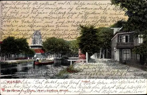 Ak Weesp Nordholland, Ortsansicht, Windmühle, Häuser, Fluss