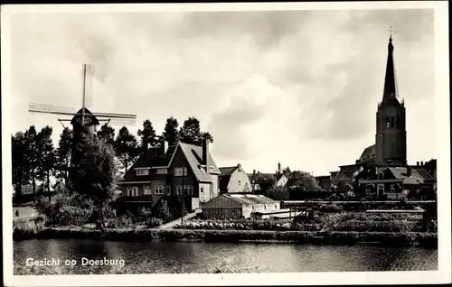 Ak Doesburg Gelderland Niederlande, Teilansicht mit Windmühle und Kirche