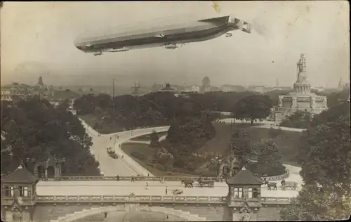 Ak Hamburg Mitte St. Pauli, Zeppelin über der Stadt, Bismarck Denkmal, LZ 13 Hansa