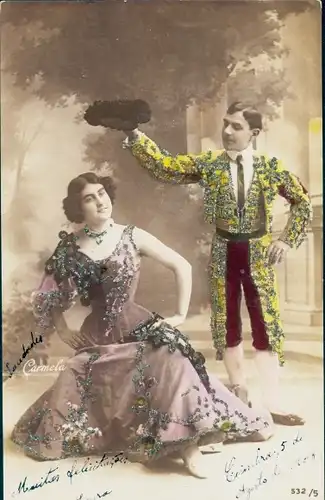 Glitzer Ak Mann und Frau in spanischen Trachtel, Carmela