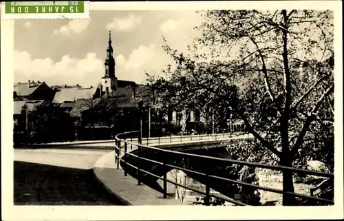 Ak Lunzenau in Sachsen, Straßenansicht mit Kirche