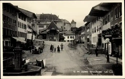 Ak Gruyères Kanton Freiburg Schweiz, La Rue, Patisserie, Shell
