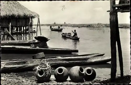 Ak Afrique Noire, Village Africain au bord de la Riviere