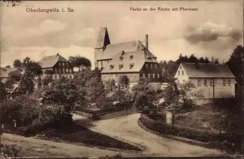 Ak Oberlungwitz Sachsen, Partie a.d. Kirche, Pfarrhaus