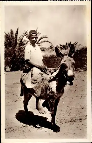 Ak Scenes et Types, Jeune berger, Junge auf Esel reitend