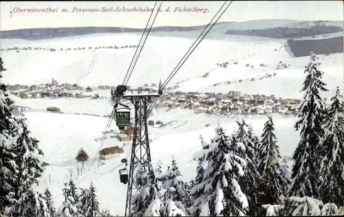 Ak Oberwiesenthal im Erzgebirge, Winterpanorama, Personen Seil-Schwebebahn auf den Fichtelberg