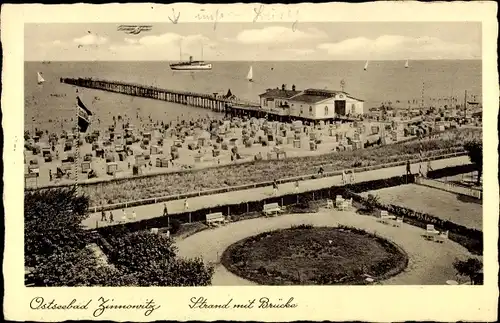 Ak Ostseebad Zinnowitz auf Usedom, Strand mit Brücke