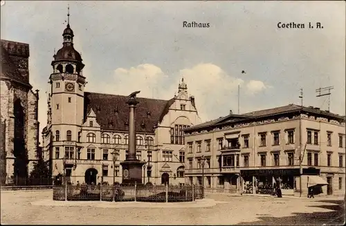 Ak Köthen in Anhalt, Rathaus, Geschäft, Kriegerdenkmal
