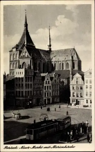 Ak Hansestadt Rostock, Neuer Markt mit Marienkirche, Straßenbahn