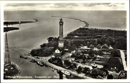 Ak Chorzelin Osternothafen Świnoujście Swinemünde Pommern, Leuchtturm und Mole