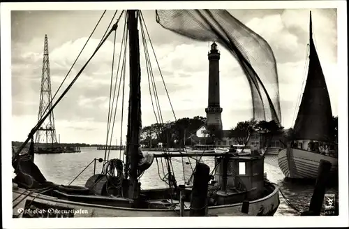 Ak Chorzelin Osternothafen Świnoujście Swinemünde Pommern, Hafen mit Leuchtturm