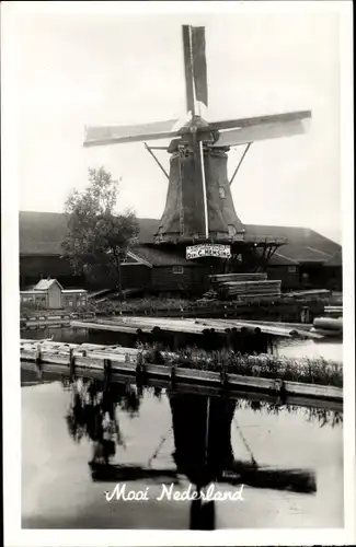 Ak Mooi Drenthe Niederlande, Ortspartie mit Windmühle