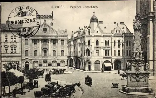 Ak Novi Sad Újvidék Neusatz Serbien, Ferencz Jozsef ter, Straßenpartie, Denkmal, Geschäftshäuser