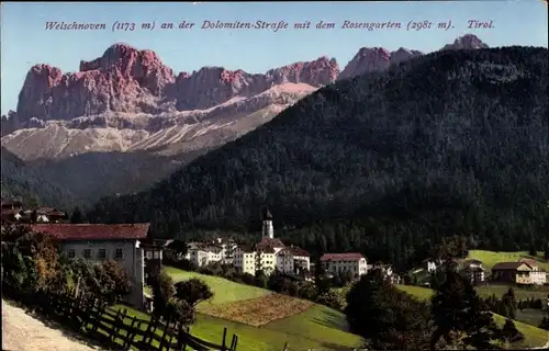 Ak Trentino Südtirol, Welschnoven an der Dolomitenstraße mit dem Rosengarten