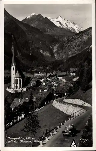 Ak Heiligenblut am Großglockner in Kärnten, Panorama, Kirche, Auto, Berge