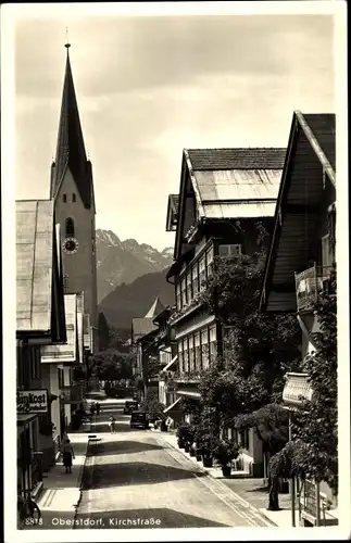 Ak Oberstdorf bayr. Allgäu, Kirchstraße mit Kirchturm