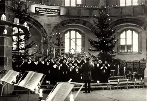 Ak Schneeberg im Erzgebirge, Kurrendesingen in der St.-Wolfgangs-Kirche zur Weihnachtszeit