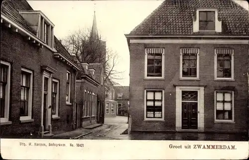 Ak Zwammerdam Südholland, Straßenpartie, Backsteinhäuser