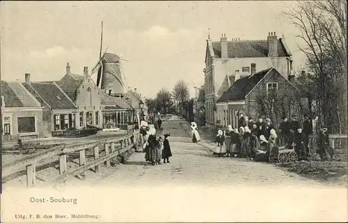 Ak Oost Souburg Zeeland Niederlande, Straßenpartie, Windmühle