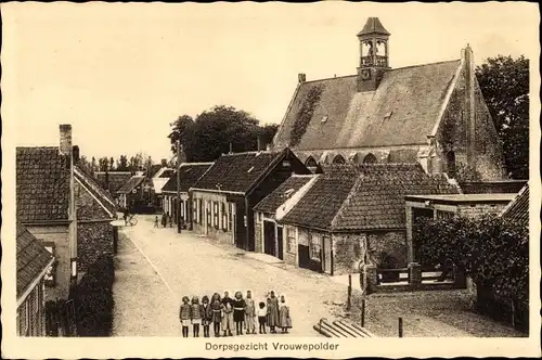 Ak Vrouwenpolder Walcheren Zeeland Niederlande, Dorfpartie, Kirche