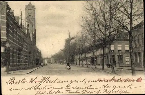 Ak Dordrecht Südholland Niederlande, Straßenpartie, Windmühle im Hintergrund