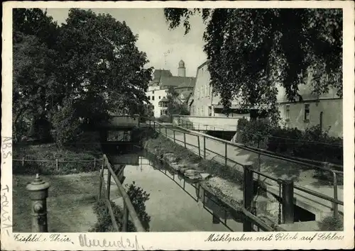 Ak Eisfeld in Thüringen, Mühlgraben mit Blick auf Schloss