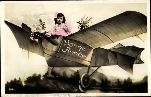 Ak Glückwunsch Neujahr, Mädchen in einem Flugzeug, Fotomontage