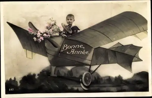 Foto Ak Glückwunsch Neujahr, Junge in einem Flugzeug, Fotomontage