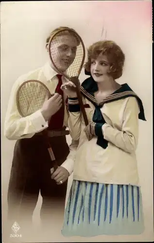 Ak Mann und Frau mit Tennisschlägern, Liebespaar