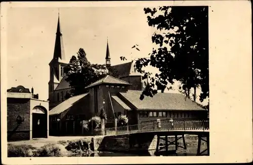 Ak Monnikendam Waterland Nordholland Niederlande, R. K. Kerk met St. Josephschool