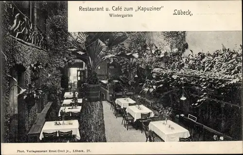 Ak Lübeck in Schleswig Holstein, Restaurant und cafe zum Kapuziner, Innenansicht, Wintergarten