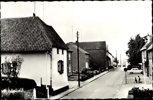 Ak Puth Limburg Niederlande, Dorpstraat, Straßenpartie