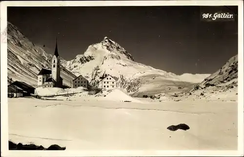 Ak Galtür in Tirol, Ortsansicht mit Kirche, Winter