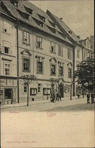 Ak Cheb Eger Reg. Karlsbad, Blick auf das Stadthaus, Geschäft, Fassade