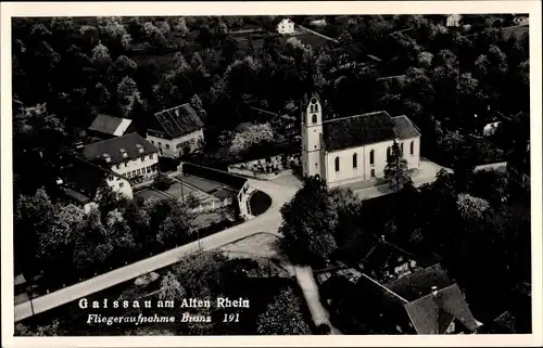 Ak Gaißau in Vorarlberg, Blick auf den Ort, Kirche, Fliegeraufnahme