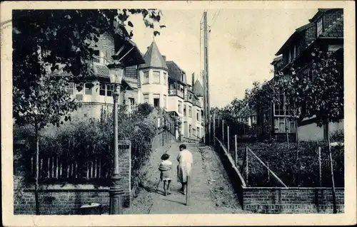 Ak La Panne Westflandern, Sentier des Lapins, Wegpartie mit Hausansicht