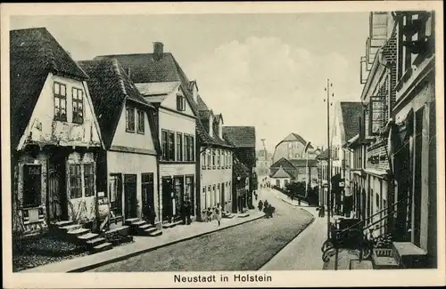 Ak Neustadt in Holstein, Hotel Seeburg mit Straßenpartie und Häusern