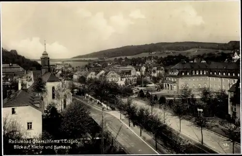 Ak Bad Oberschlema Bad Schlema im Erzgebirge Sachsen, Mühlenstraße mit Kirche und Kurhaus