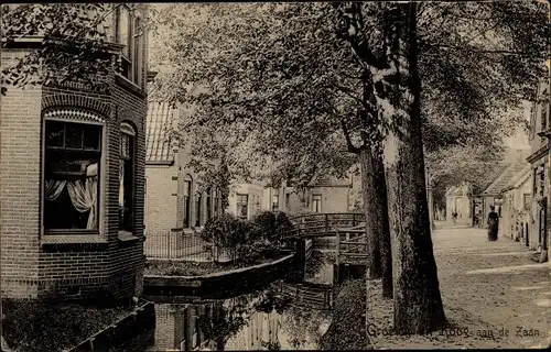 Ak Koog aan de Zaan Nordholland Niederlande, Straßenpartie, Fluss, Brücke, Häuser