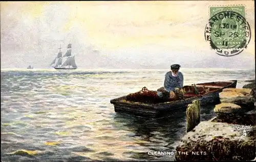 Ak Cleaning the nets, Fischer im Boot beim Reinigen der Netze, Segelschiff