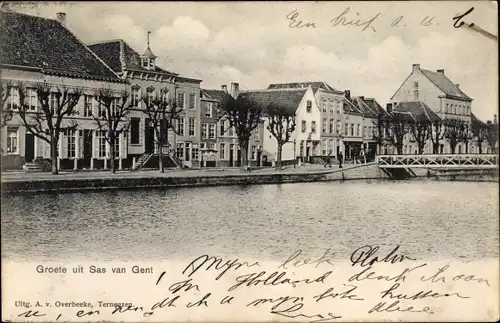 Ak Sas van Gent Zeeland, Häuserreihe, Fluss, Brücke