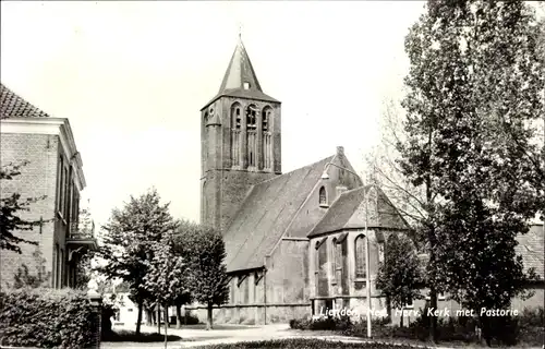 Ak Lienden Buren Gelderland, Ned. Herv. Kerk met Pastorie
