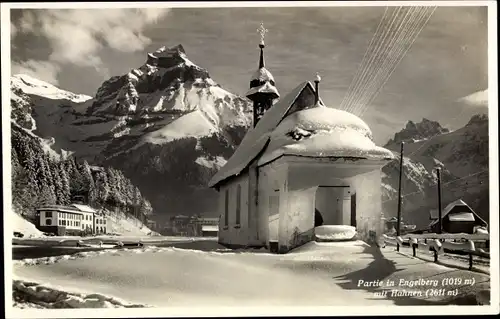 Ak Engelberg Kanton Obwalden Schweiz, Ortspartie mit Hahnen, Kirche