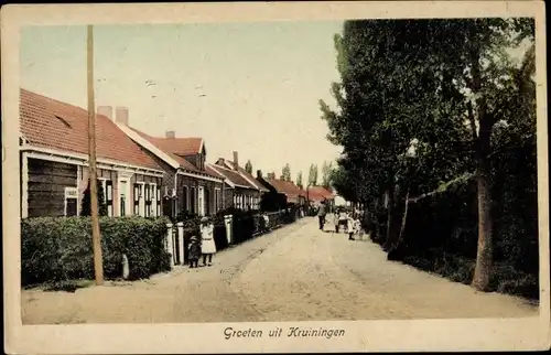 Ak Kruiningen Zeeland Niederlande, Straßenpartie, Wohnhäuser