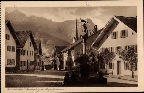 Ak Garmisch Partenkirchen in Oberbayern, Floriansplatz mit Zugspitzmassiv