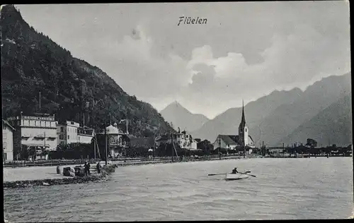 Ak Flüelen Kanton Uri Schweiz, Blick zur Kirche, Bootspartie