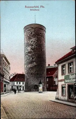 Ak Lubsko Sommerfeld Ostbrandenburg, Büttelturm, Straßenansicht, Tabakladen