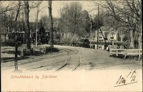 Ak Schuddebeurs Schouwen Duiveland Zeeland, Straßenpartie, Schienenbahnen