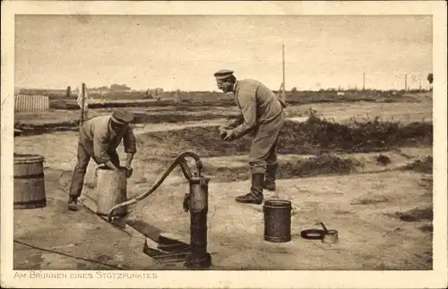 Ak Deutsche Soldaten in Uniformen am Brunnen eines Stützpunktes, I WK