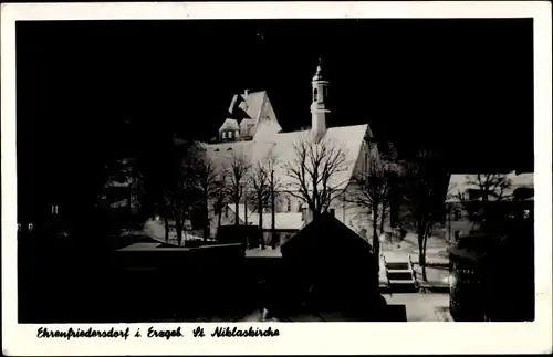 Ak Ehrenfriedersdorf im Erzgebirge, St. Niklaskirche, Winter, Nachtbeleuchtung